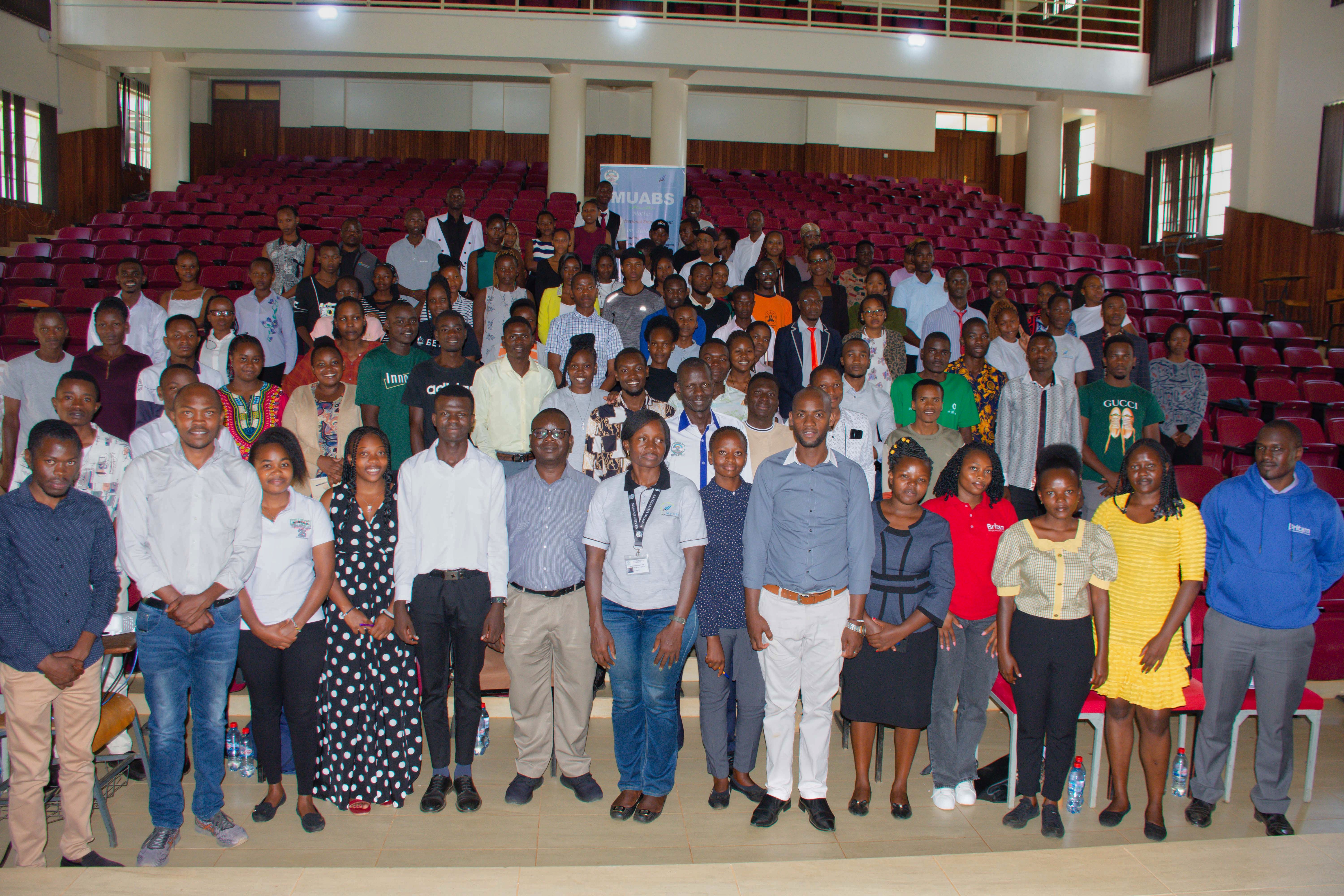 Participants of the summit pose with members of faculty from the School of Business and Economics and the invited guests.